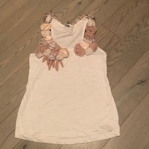 Anthropologie tank top with embroidered neutral flowers. Size small.